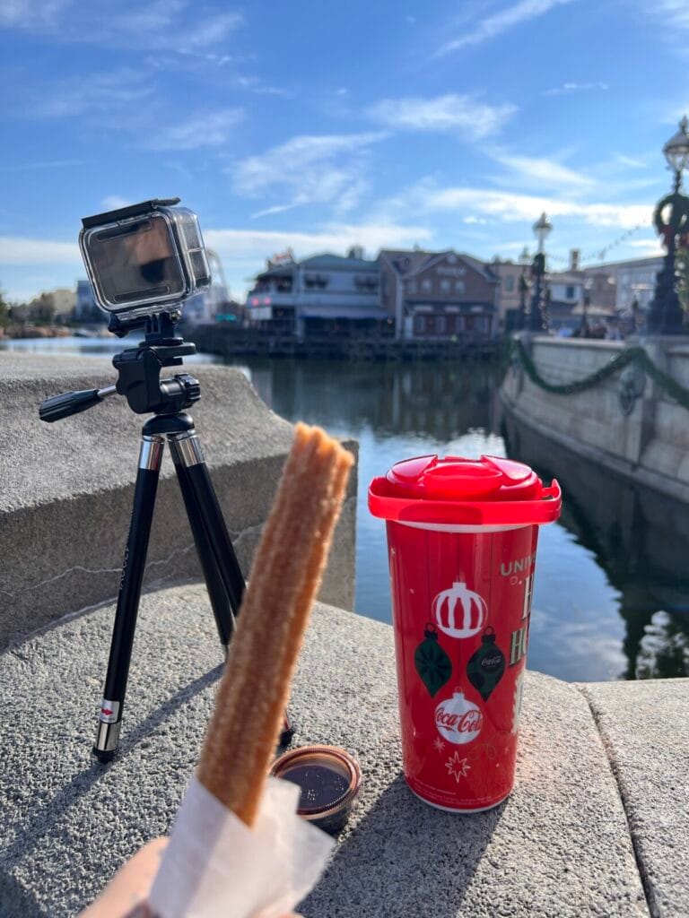 a food on a tripod next to a camera