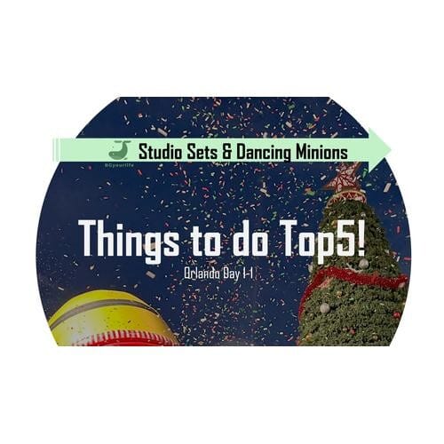 a blue circle with white text and a christmas tree