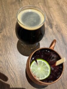 a glass of beer and a cup of liquid
traverse city best restaurant