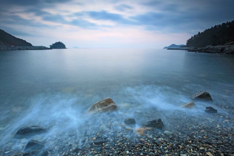 Serene beach with smooth pebbles gaedo